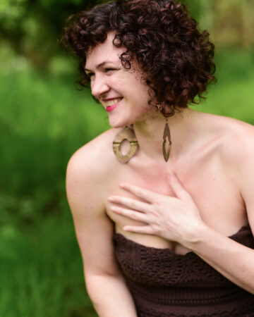 Laughing hand on heart